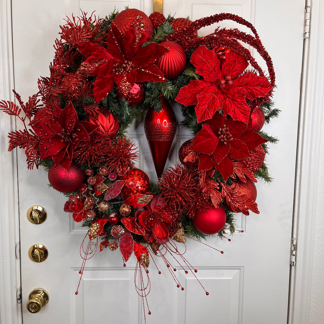 Festive Red Christmas Wreath with Poinsettias and Ornaments